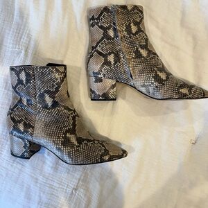 Snakeskin print high booties